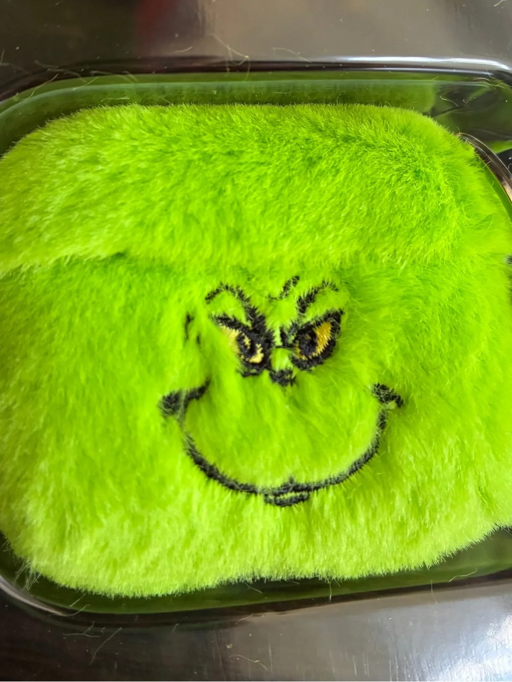 The Grinch Plush AirPods Pro Case in Bright Green with Keyring
